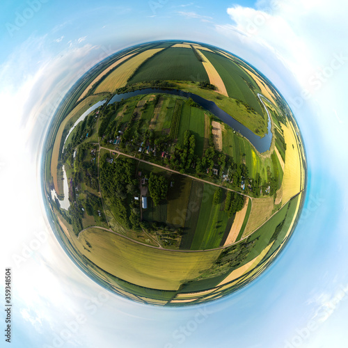 Srednyi small farm at the bend of the Sredny Zelenchuk River in the Krasnodar Territory (South of Russia). Gorgeous aerial 360 small planet panorama on a summer day photo