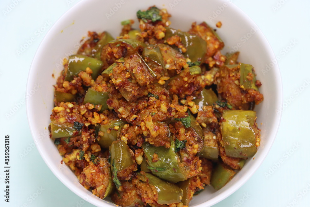 Brinjal or Egg plant dry fry, south Indian curry with roasted peanut powder