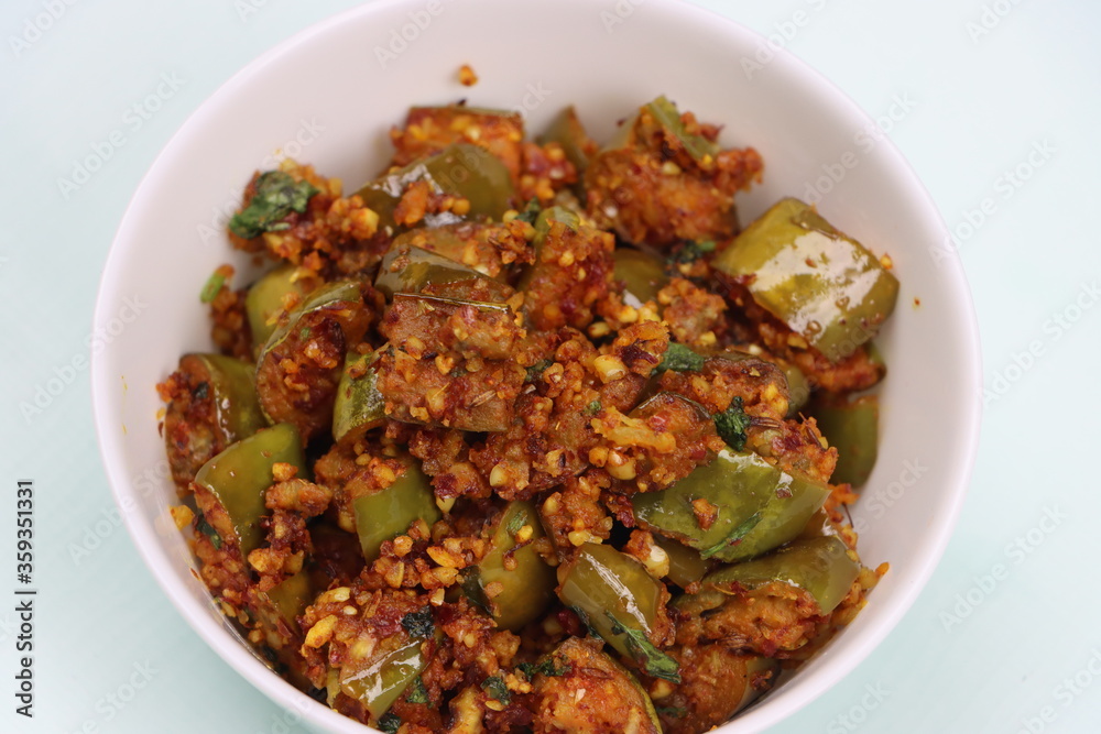 Brinjal or Egg plant dry fry, south Indian curry with roasted peanut powder Brinjal or Egg plant dry fry, south Indian curry with roasted peanut powder