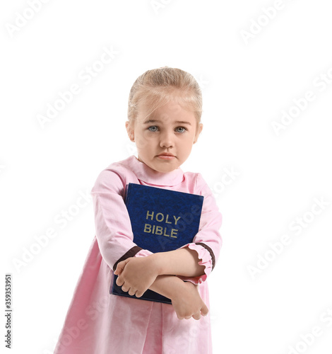 Little girl with Bible on w...