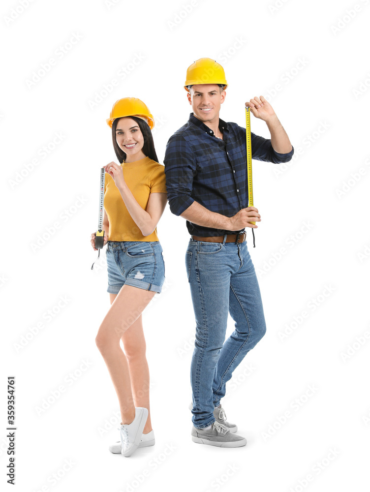 Couple with measuring tapes on white background Couple with measuring tapes on white background