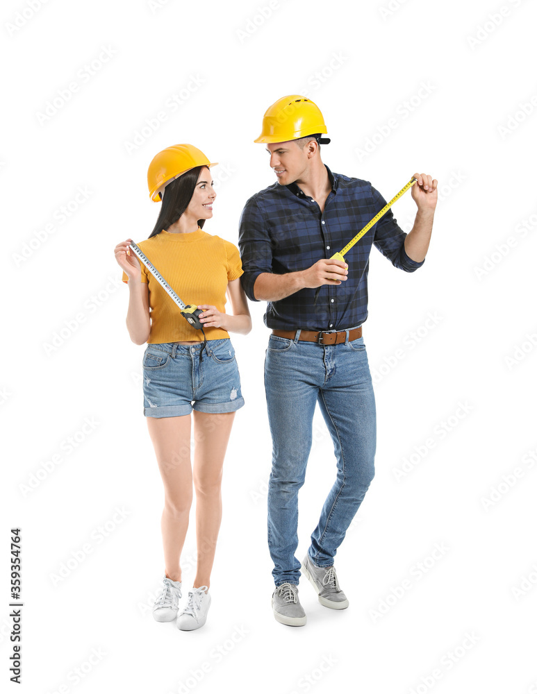 Couple with measuring tapes on white background Couple with measuring tapes on white background