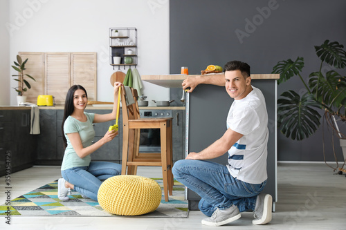 Couple with measuring tapes...