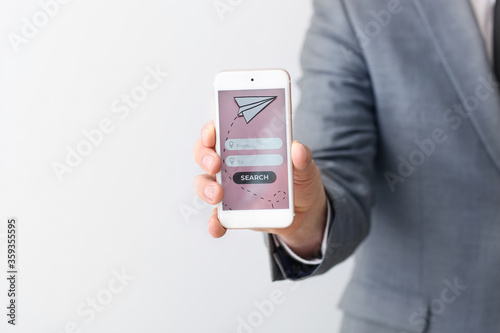 Businessman with mobile pho...