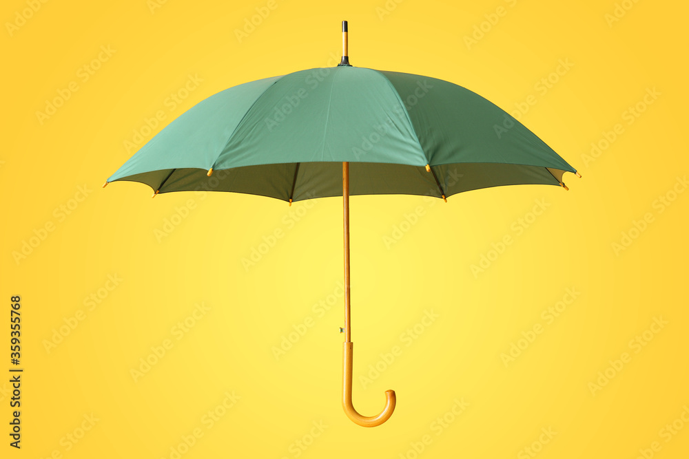 Stylish umbrella on color background Stylish umbrella on color background