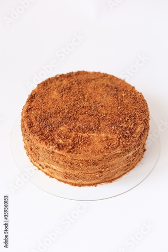 homemade honey cake on white background isolated