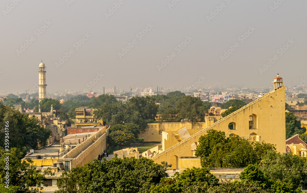 Jaipur, Rajasthan, India; Feb, 2020 : aerial view of the biggest sundial in Jantar Mantar and the city of Jaipur, Jaipur, Rajasthan, India