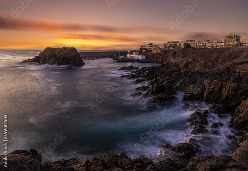 beautiful and dramatic sunset over the resort of El Cotillo in Fuertaventura