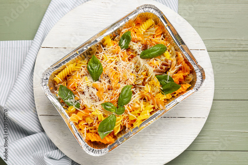 Tasty baked pasta in dish on table
