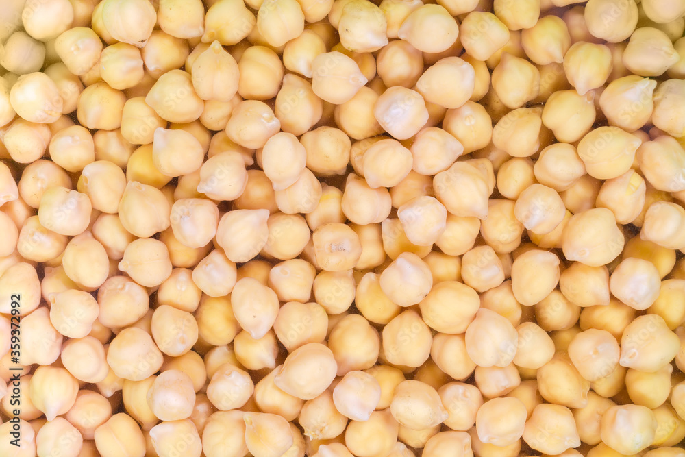 Background of the chickpeas soaked in cold water before cooking Background of the chickpeas soaked in cold water before cooking