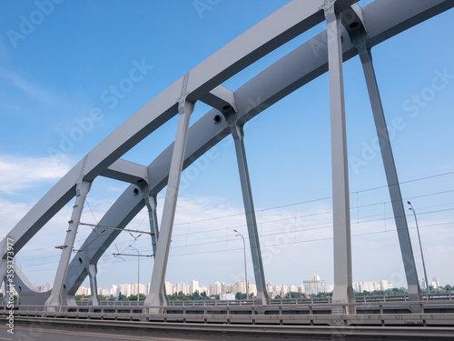 Fragment of steel arch of combined road and railroad bridge