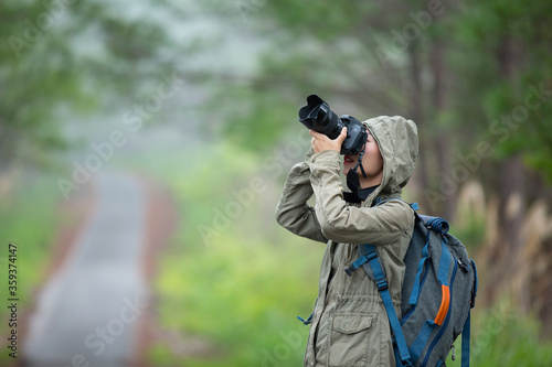 A woman with a camera World photographer day.