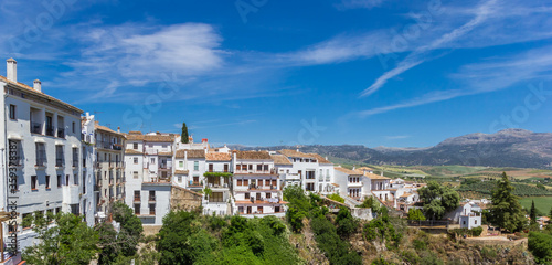 Panorama of white houses on the cliffs of historic city Ronda, Spain © venemama
