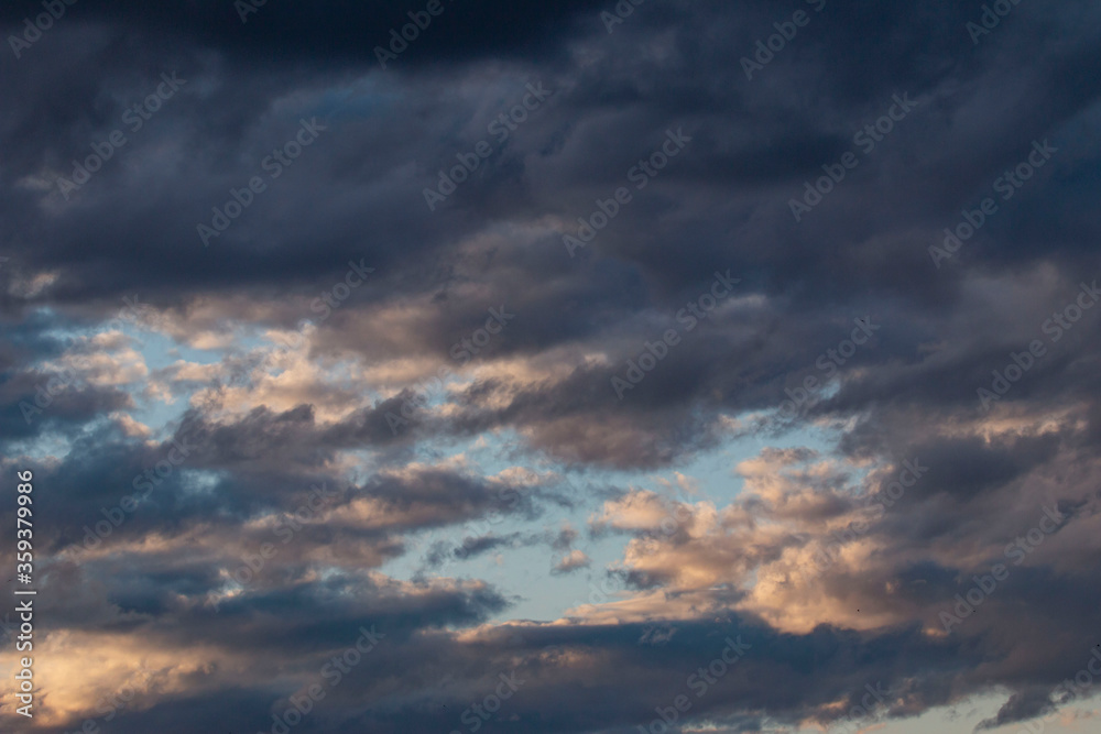 stormy sky at sunset as a background