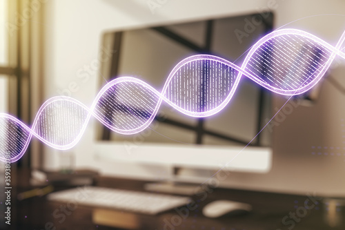 Double exposure of creative DNA hologram on laptop background. Bio Engineering and DNA Research concept