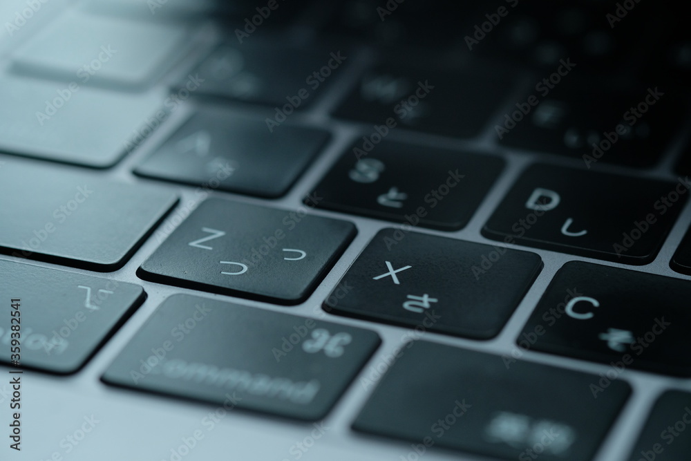 キーボード。テレワーク。在宅勤務。お洒落デスク。Close Up keyboard. Keys with Japanese font. Wood office desk table with laptop, notebook and pencil. キーボード。テレワーク。在宅勤務。お洒落デスク。Close Up keyboard. Keys with Japanese font. Wood office desk table with laptop, notebook and pencil.
