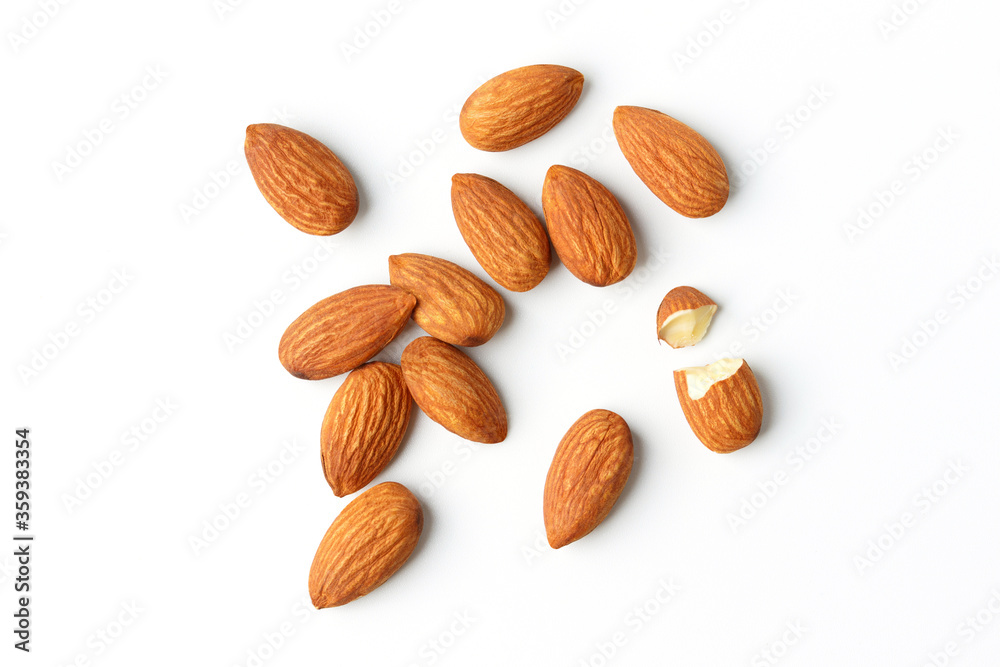 Almond lays the top corner shooting pile on the white background with clipping path suitable for product Almond lays the top corner shooting pile on the white background with clipping path suitable for product