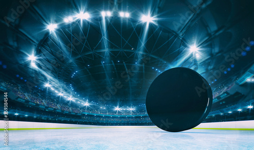 Magnificent ice hockey arena with a hockey puck on a ice rink with spectators on the grandstand. Professional world sport 3D illustration background.