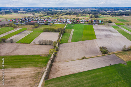 Drone view on a field patchwork in Jaczew, small village in Mazowsze region of Poland