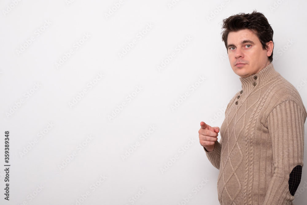 Handsome man pointing at empty space. Banner with blank space for text. Handsome man pointing at empty space. Banner with blank space for text.
