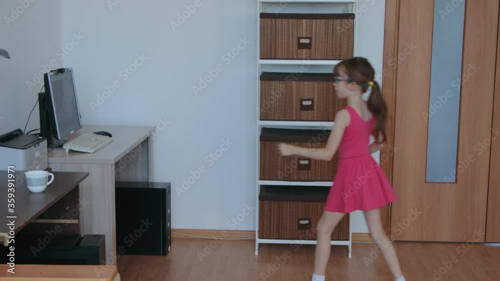 Little girl taking online classes at home during covid 19 epidemic Little girl taking online classes at home during covid 19 epidemic