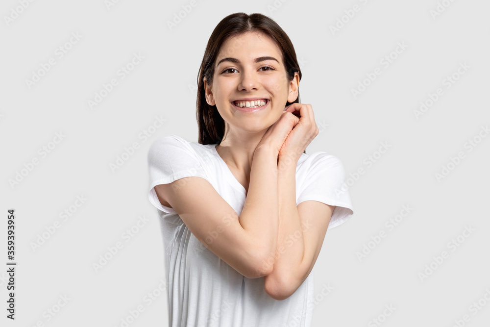 Happy woman portrait. Affection love. Amused lady smiling isolated on neutral background. Happy woman portrait. Affection love. Amused lady smiling isolated on neutral background.