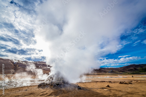 Hverir geothermal area with boiling mudpools and steaming fumaroles in Iceland