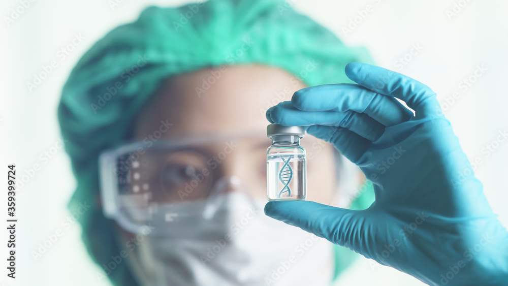 Woman doctor holding transparent glass bottle with DNA icon inside on her hand. Woman doctor holding transparent glass bottle with DNA icon inside on her hand.