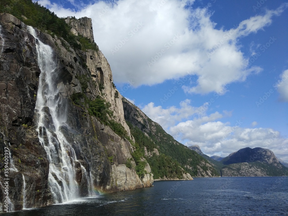 Beautiful Norwegian mountains, waterfall and cliffs in the Lysefjord, Norway. 