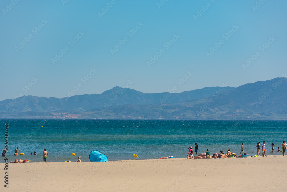 Sunny day in the tourist town of Canet en Roussillion in France on the Mediterranean Sea. Sunny day in the tourist town of Canet en Roussillion in France on the Mediterranean Sea.