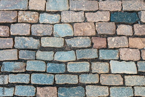 a cobblestone pavement made of rectangular stone in the ancient Peter and Paul Fortress in St. Petersburg, Russia