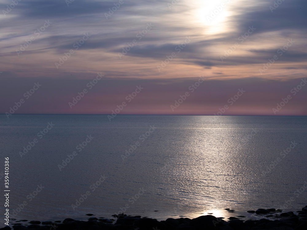 Dramatic violet and blue sunset, amazing sunset, violet sunset, romantic photo, beautiful sunset in Malta, autumn sunset, sunset in island, sun going to the sea, ocean, romantic view