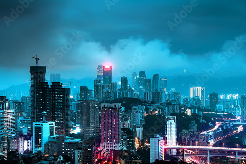 High-rise mountain city night  China s western city of Chongqing.