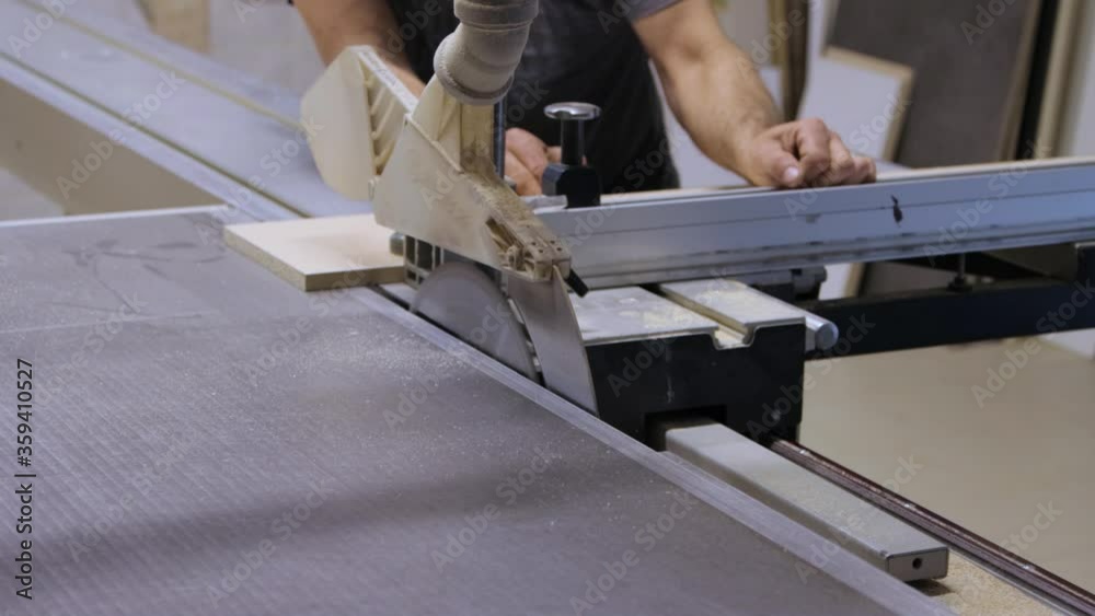 Cutting process on circular saw in closeup Cutting process on circular saw in closeup