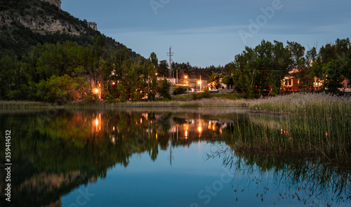 Old town in the middle of the mountain with the reflection of the water Cuenca Uña Spain