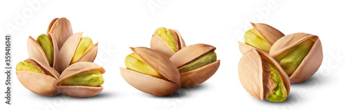 A set with Fresh raw Pistachios isolated on white background. High resolution