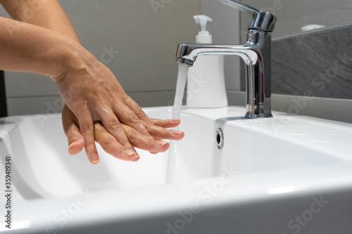 Washing hands rubbing with soap woman for corona virus prevention, hygiene to stop spreading coronavirus