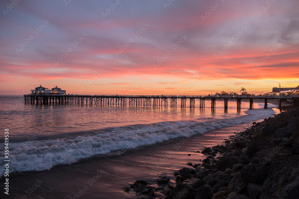 Fototapeta premium Malibu pier sunset near Los Angeles on the Southern California coast.