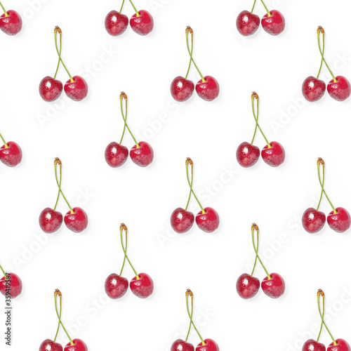 Pattern of cherry berries on white background. Food, fruit print