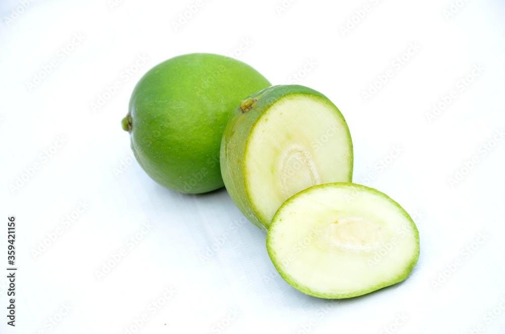sliced green ripe mango isolated on white background sliced green ripe mango isolated on white background