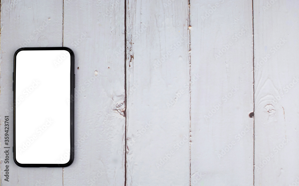 White screen phones simulate space for text advertisements, do business, communicate with people, technology located on wooden floors. White screen phones simulate space for text advertisements, do business, communicate with people, technology located on wooden floors.