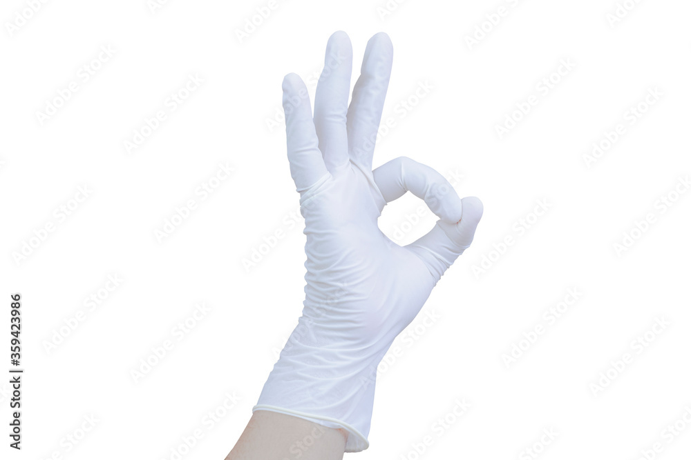 Humans wear white medical gloves and hands that carry the symbol OK. On a white background (With Clipping Path) Humans wear white medical gloves and hands that carry the symbol OK. On a white background (With Clipping Path)