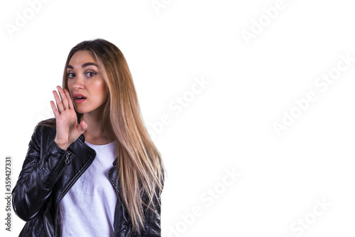 The girl whispers softly. Classified information. Concept of advertising and discounts. Isolated on a white background