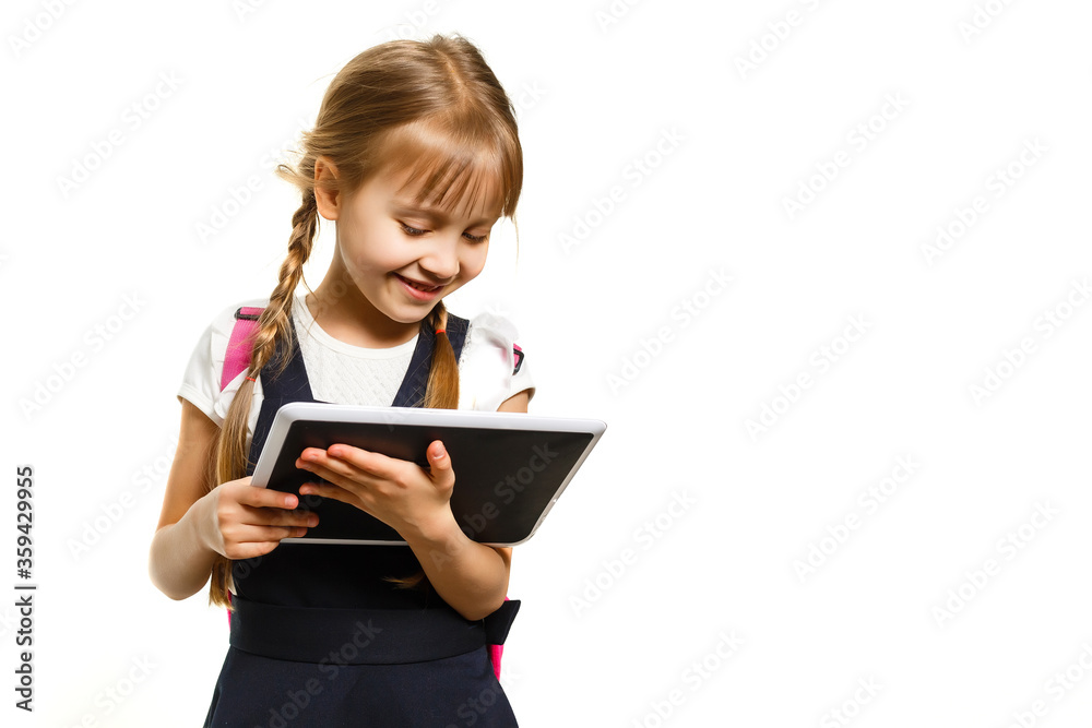 little girl using tablet computer. Isolated on white background. little girl using tablet computer. Isolated on white background.
