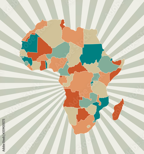 Africa map. Poster with map of the continent in retro color palette. Shape of Africa with sunburst rays background. Vector illustration.