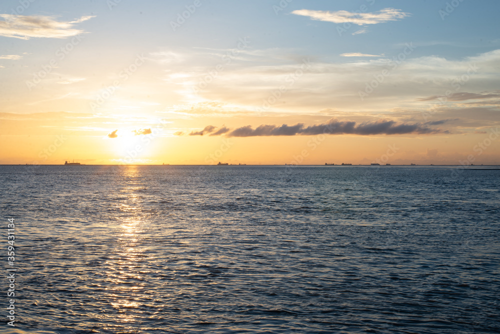 Sunset in the sea Water.