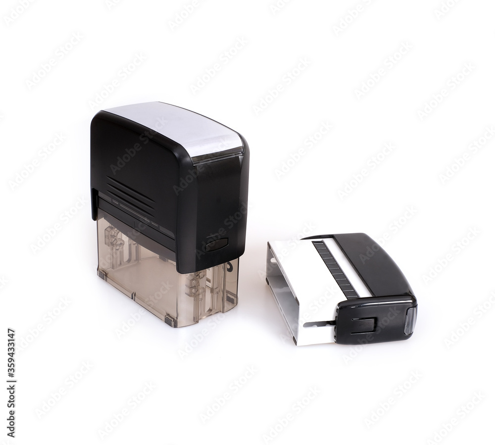 Black plastic automatic stamp for documents isolated on white background Black plastic automatic stamp for documents isolated on white background