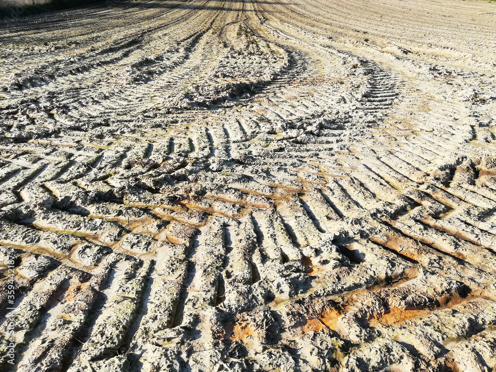 tractor tire tracks in the mud. Countryside. tractor tire tracks in the mud. Countryside.