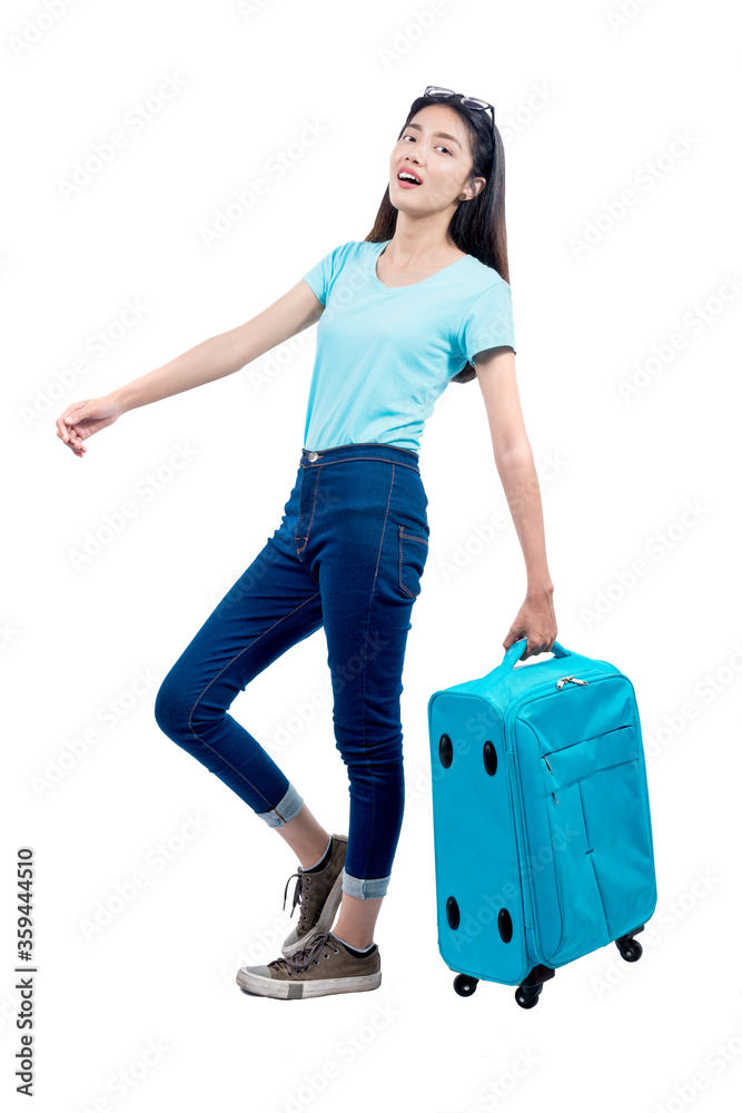 Asian woman standing with suitcase Asian woman standing with suitcase