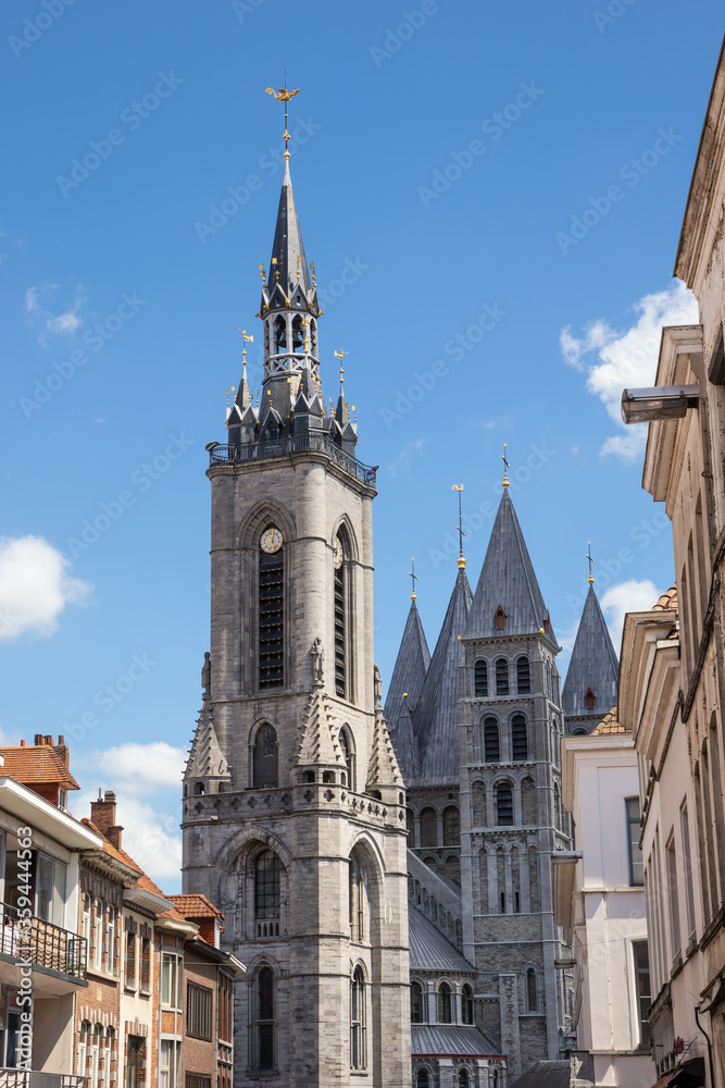 Obraz premium View of the belfry of Tournai with in the background the spires of the Tournai Cathedral